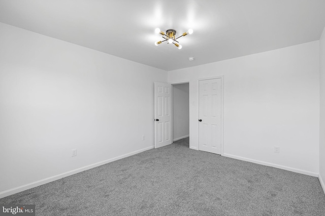 spare room with carpet