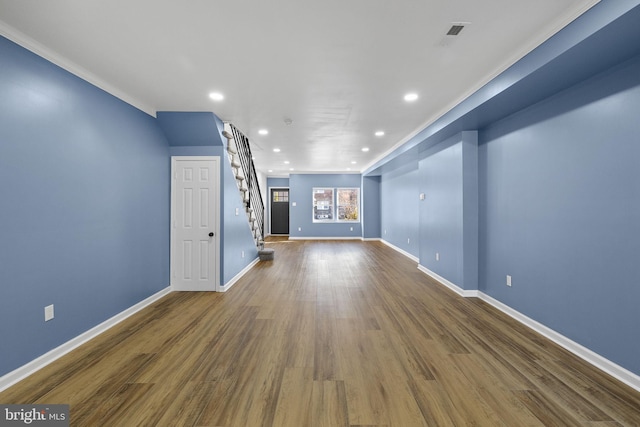 unfurnished living room featuring hardwood / wood-style floors