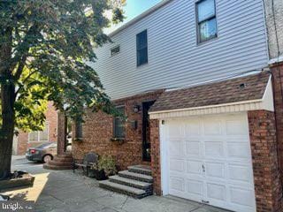 exterior space with a garage