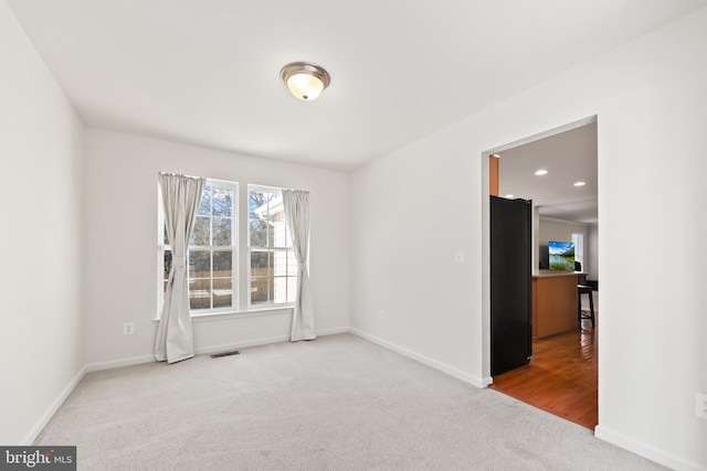 view of carpeted spare room