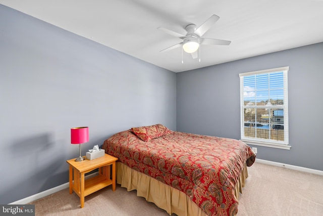 bedroom featuring ceiling fan and carpet flooring