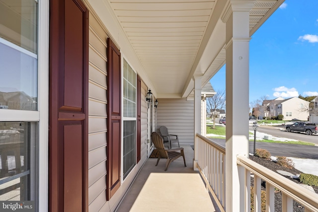 balcony featuring covered porch