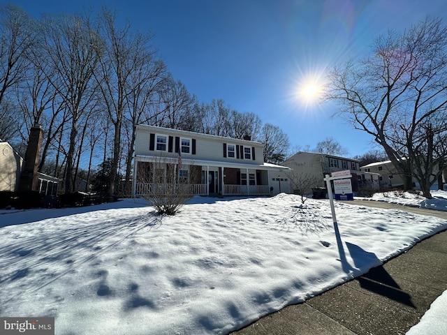 front of property featuring covered porch