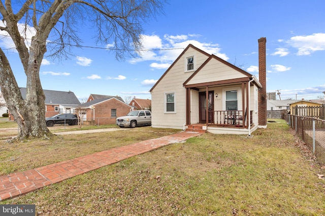 bungalow with a front yard