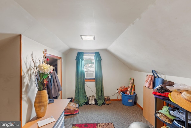 rec room featuring carpet flooring and lofted ceiling