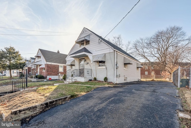 view of front of home with a front yard