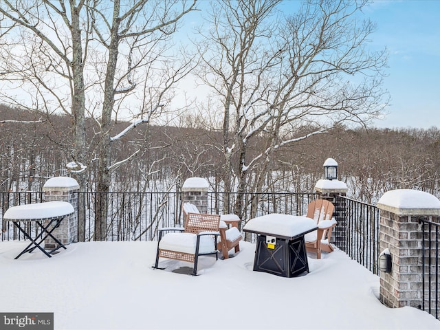 view of snow covered patio