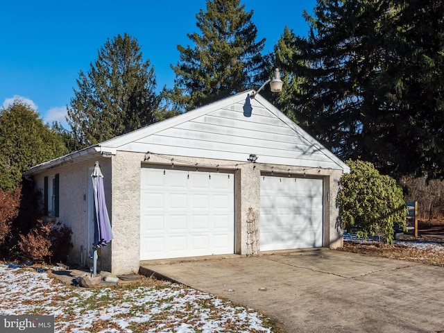 view of snow covered garage