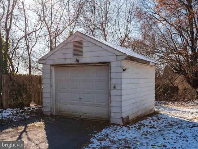 view of snow covered garage