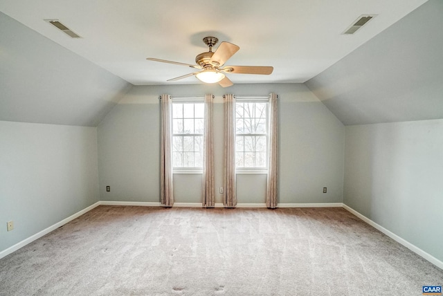 bonus room featuring light carpet, ceiling fan, and lofted ceiling