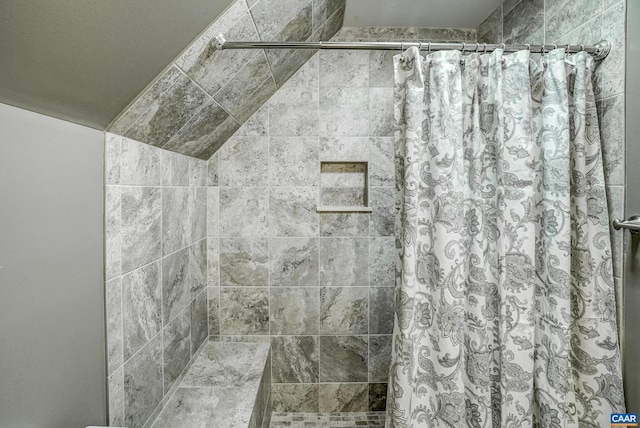 bathroom featuring curtained shower