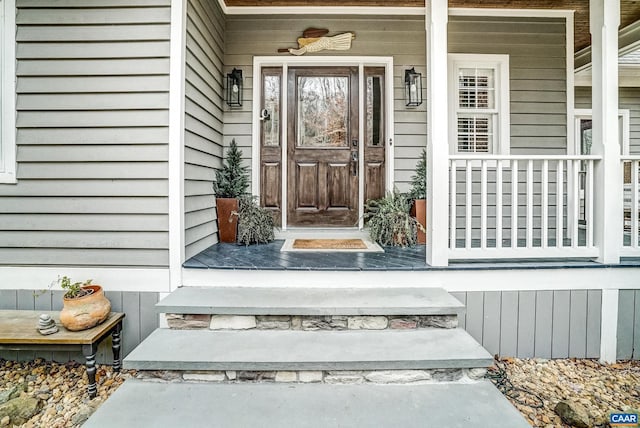 entrance to property with a porch