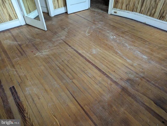 details featuring hardwood / wood-style flooring and a baseboard radiator