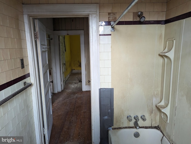 bathroom featuring  shower combination