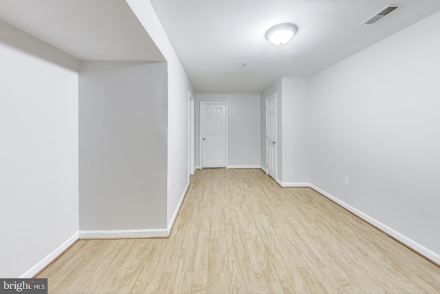 unfurnished room with light hardwood / wood-style flooring