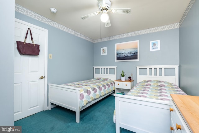 carpeted bedroom with ceiling fan