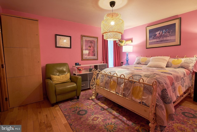 bedroom featuring hardwood / wood-style floors