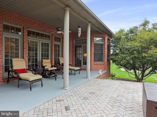 view of patio / terrace featuring ceiling fan