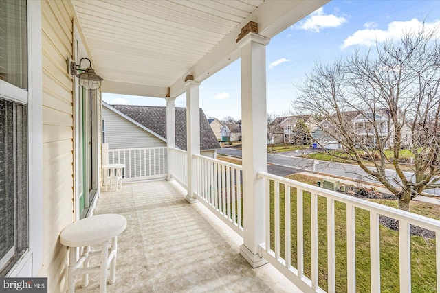 balcony featuring a porch