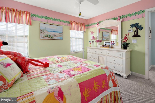 carpeted bedroom with ceiling fan