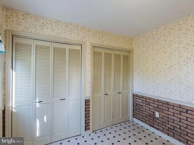 interior space featuring multiple closets