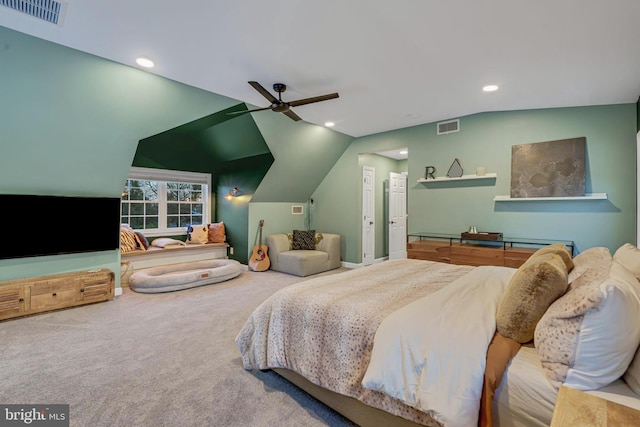 carpeted bedroom featuring ceiling fan and lofted ceiling