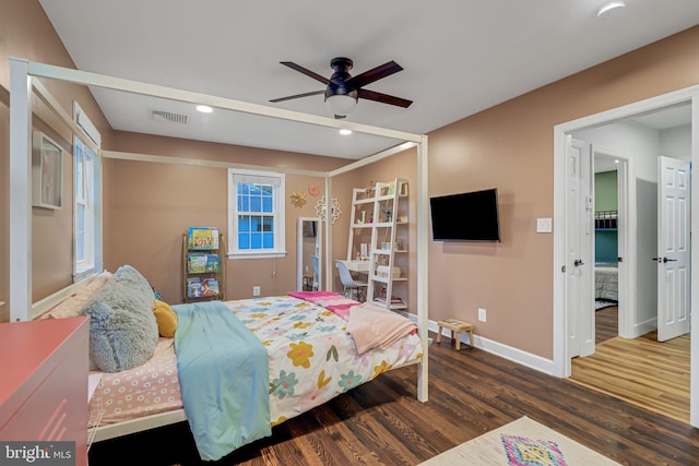 bedroom featuring ceiling fan and dark hardwood / wood-style flooring