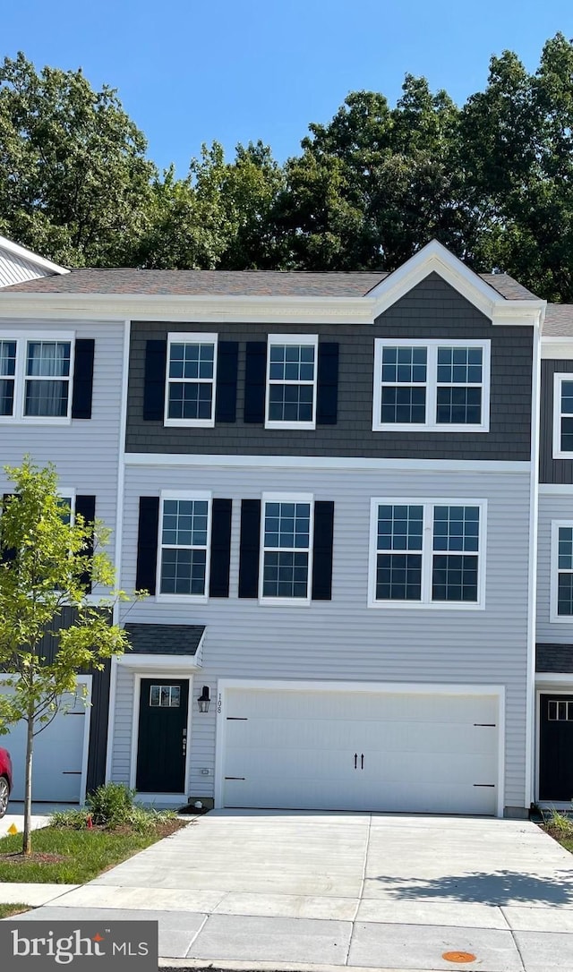 view of front of property with a garage