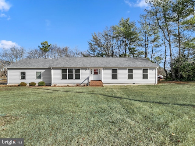 ranch-style home featuring a front lawn