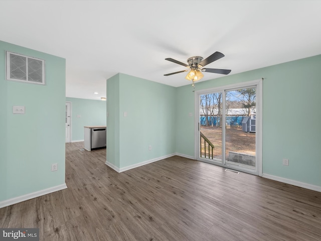 unfurnished room with ceiling fan and light hardwood / wood-style floors