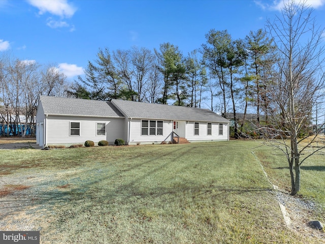 ranch-style house with a front lawn