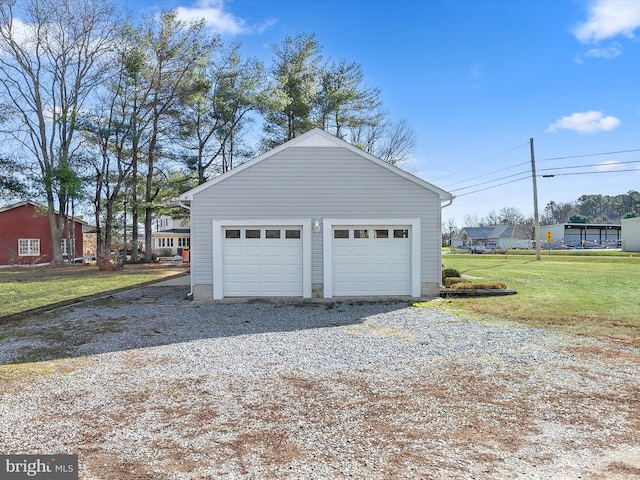 garage with a lawn