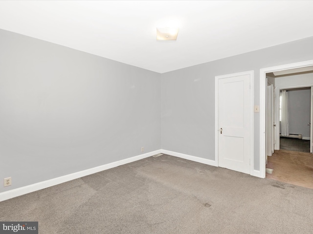 empty room featuring carpet