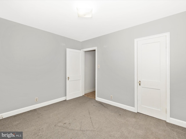 spare room with carpet