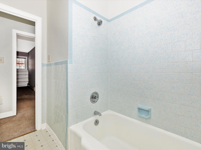 bathroom featuring bathing tub / shower combination