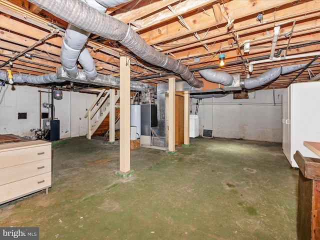 basement featuring washer / dryer and gas water heater