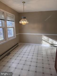 unfurnished dining area with a baseboard heating unit and a notable chandelier