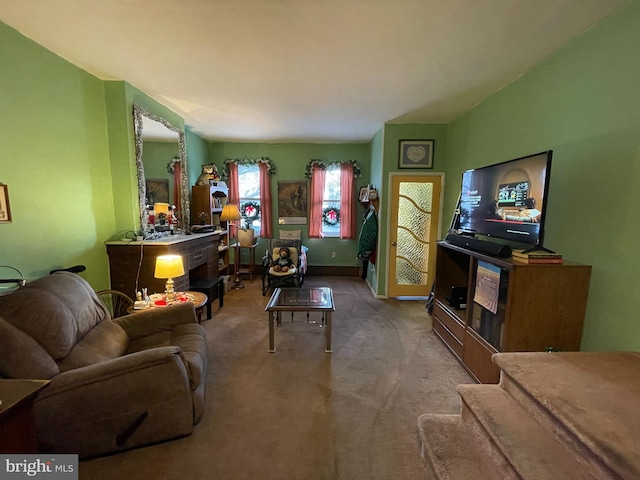 living room featuring light carpet