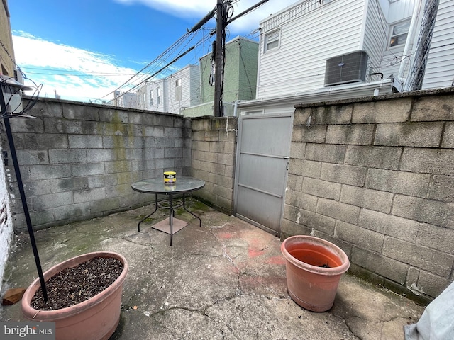 view of patio with central air condition unit