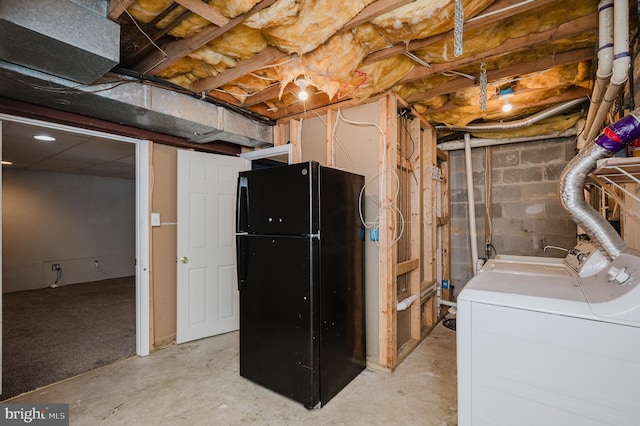 basement featuring black fridge