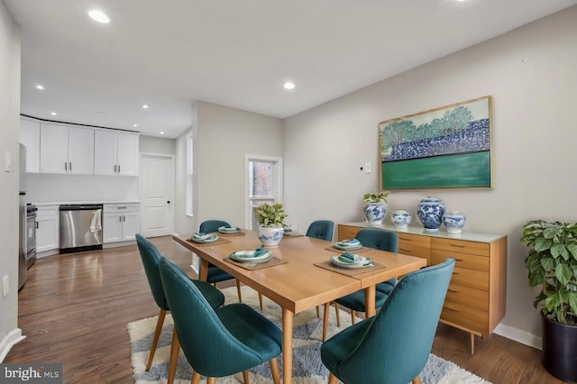 dining room featuring dark wood-type flooring