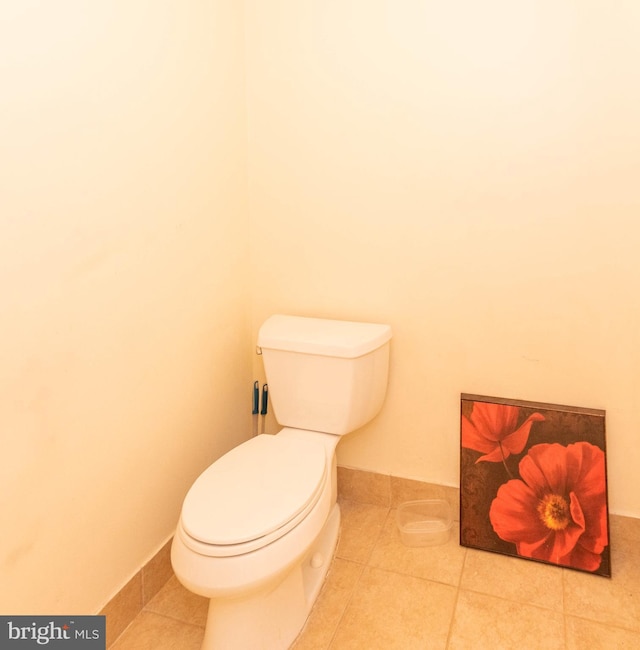 bathroom featuring tile patterned flooring and toilet