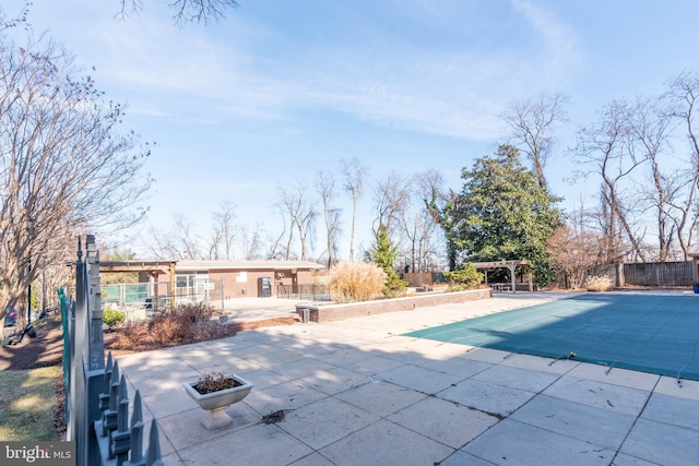 view of pool featuring a patio and a pergola