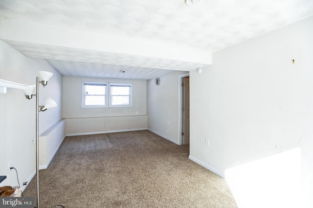 unfurnished room featuring carpet flooring