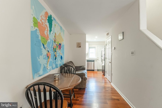 hall featuring hardwood / wood-style flooring