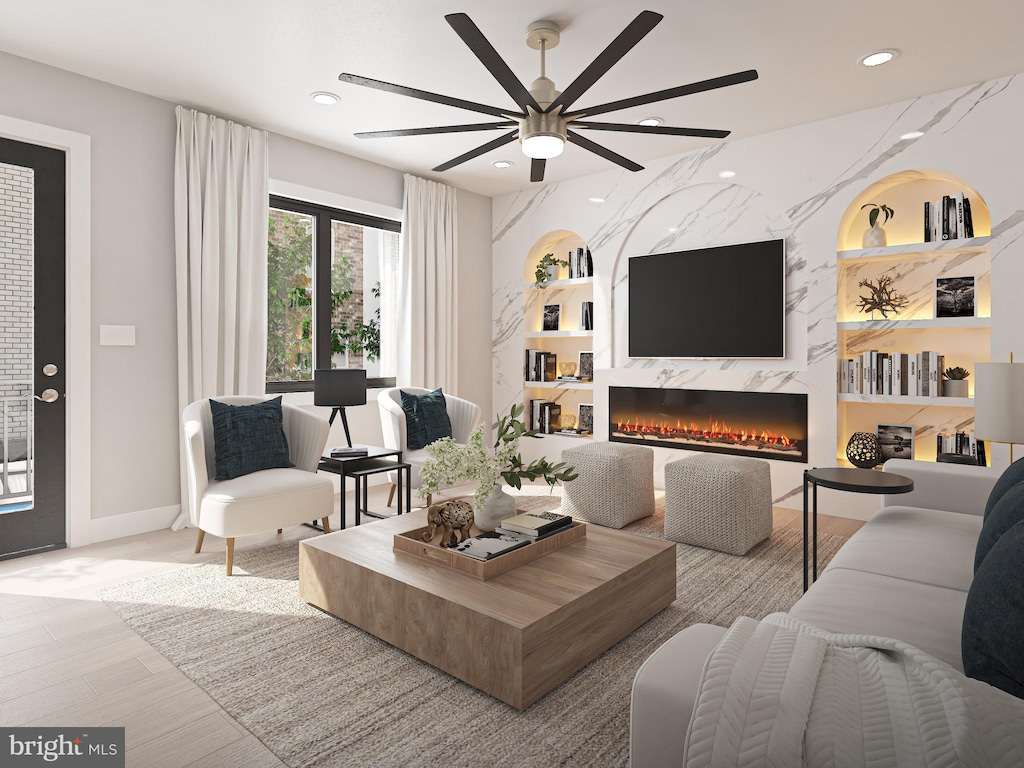1110 N 3rd St, Philadelphia, PA 19123 - living area with ceiling fan, a fireplace, recessed lighting, built in shelves, and baseboards