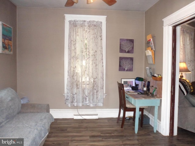 office space with dark wood-type flooring and ceiling fan