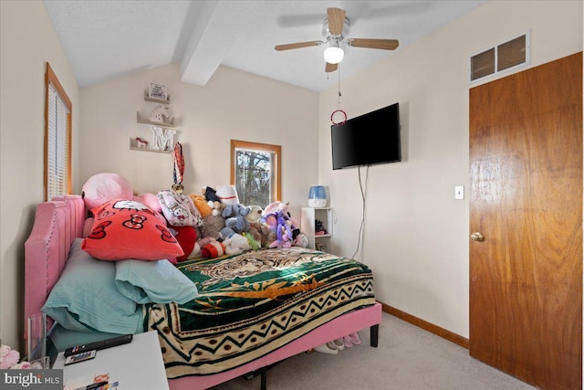 carpeted bedroom with vaulted ceiling with beams, ceiling fan, and a textured ceiling