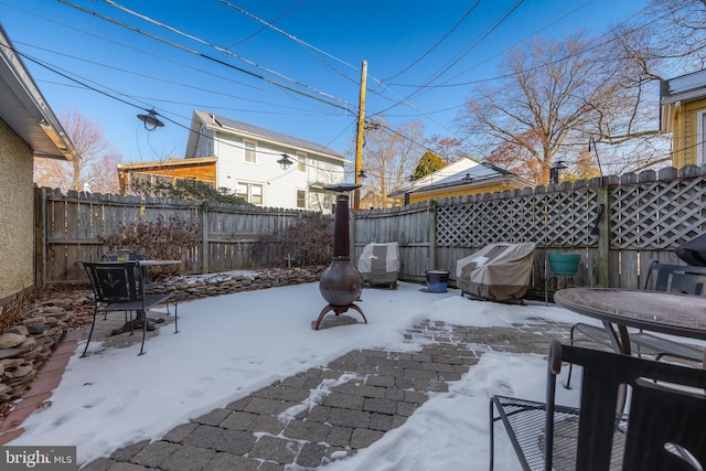 view of yard covered in snow