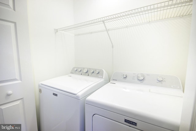 laundry area featuring independent washer and dryer